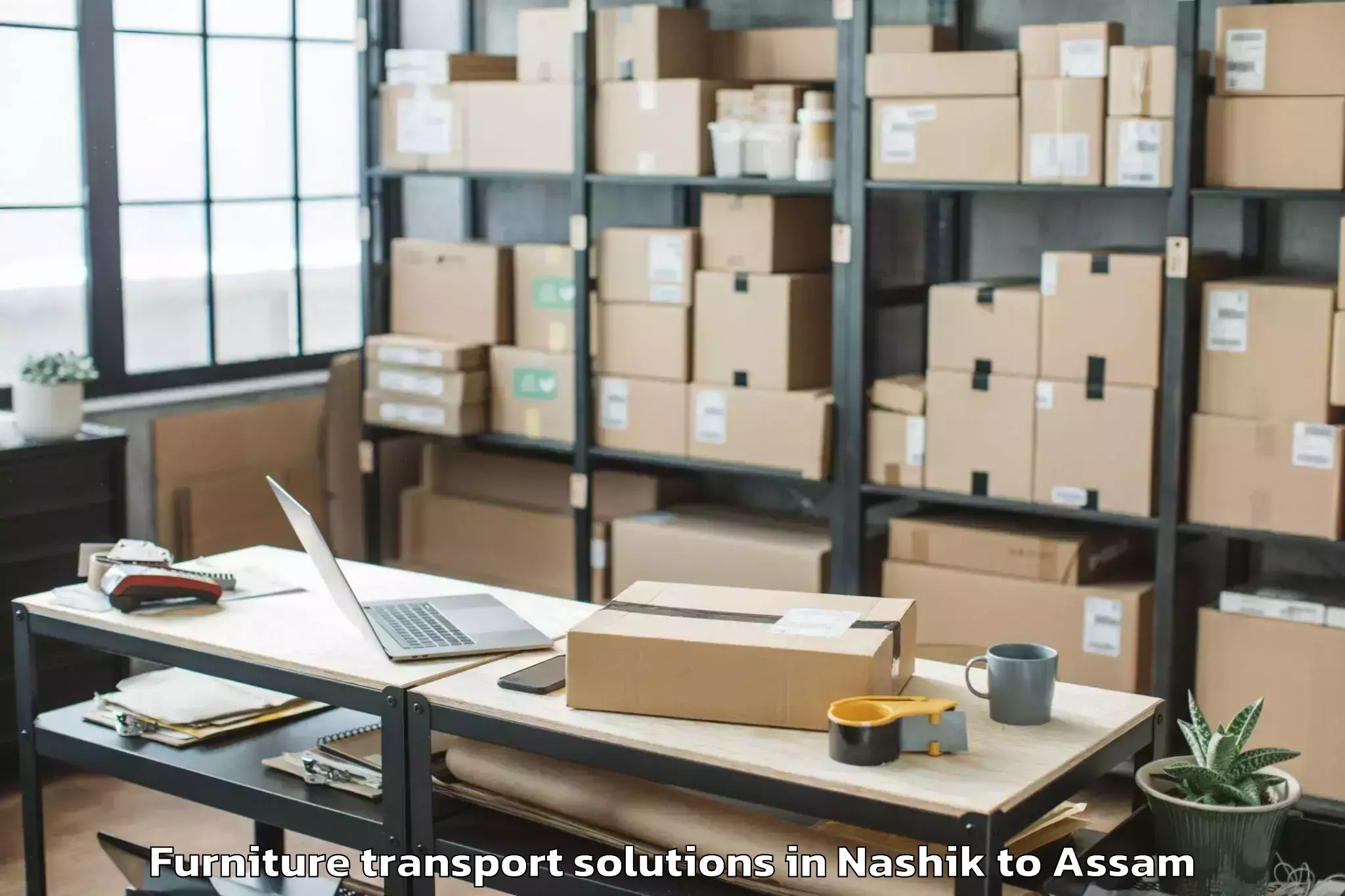 Book Nashik to Lumding Rly Colony Furniture Transport Solutions